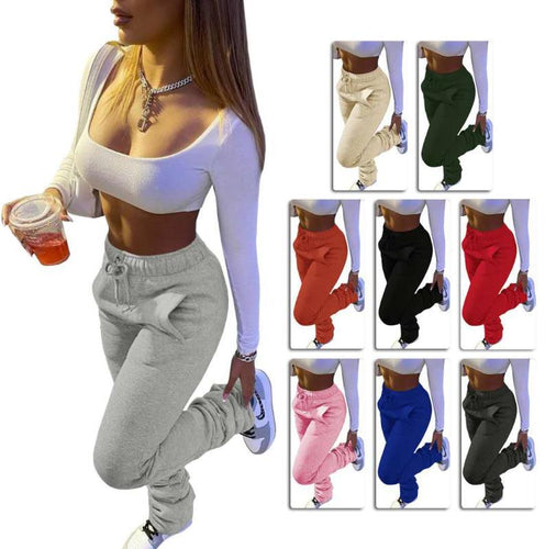 Casual women's sports pants with elastic waistband and practical side pockets Amarae