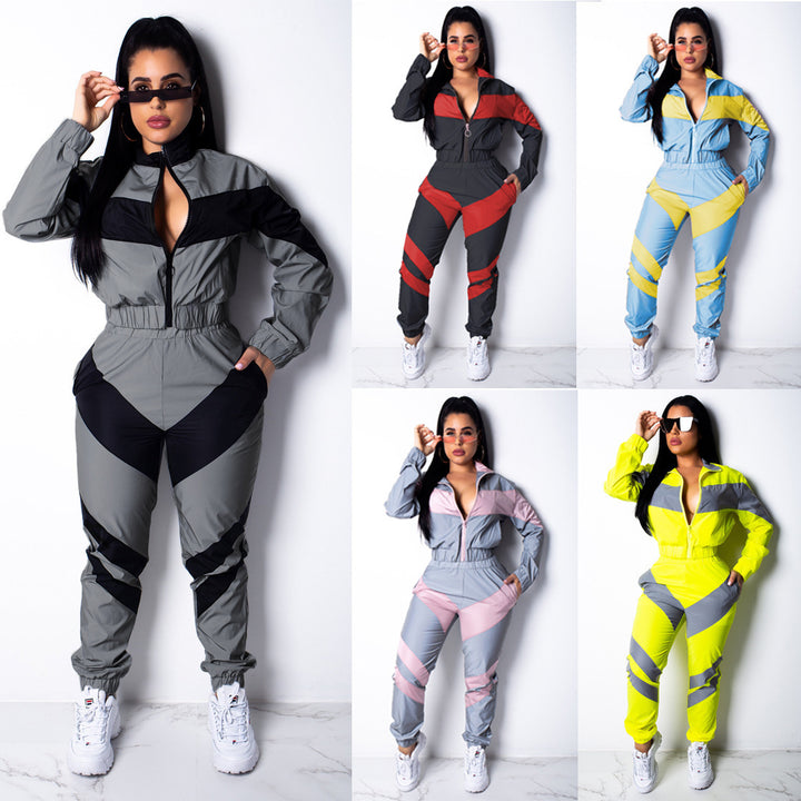 Ladies sporty jumpsuit with stylish color block elements and a high collar Lune London
