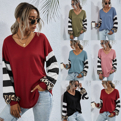Women V-neck sports top with striking sleeves and unique details Lune London
