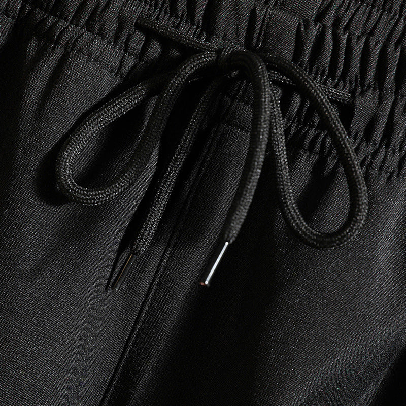 Men's sports costume with striped details Lune London