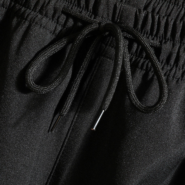 Men's sports costume with striped details Lune London