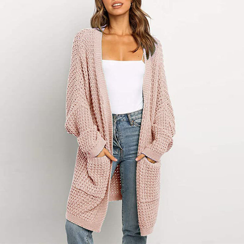 Ladies Large knitted cardigan with a loose fit and deep pockets Lune London