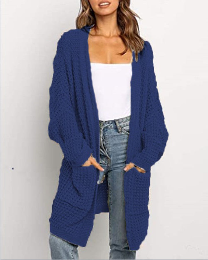 Ladies chunky knit cardigan with open sleeves and deep pockets Lune London