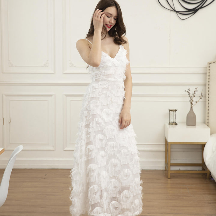 Ladies maxi dress with trendy fringes and seductive V-neck Lune London