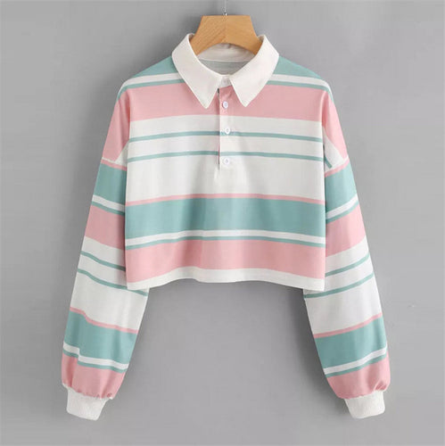 Women's polo shirt in a casual crop design with a stylish color block pattern Chic & Stil