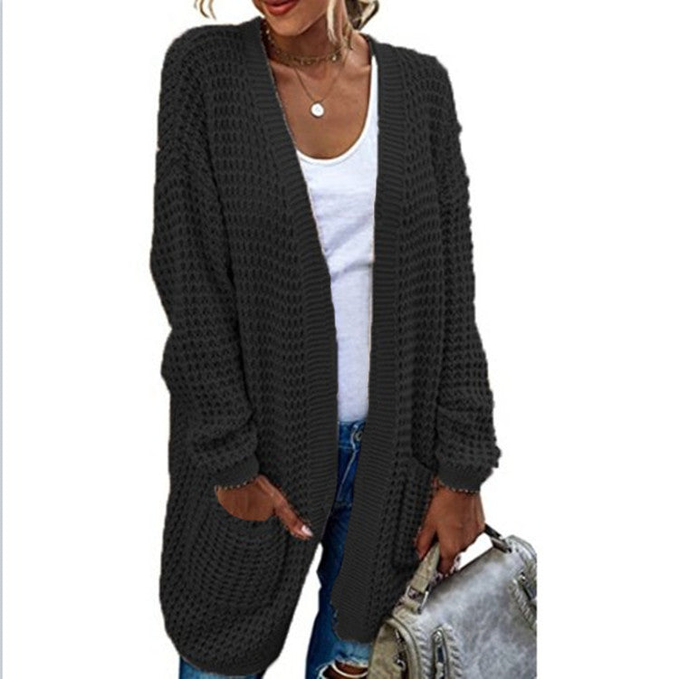 Thick knit cardigan for women with a relaxed fit and deep pockets Lune London