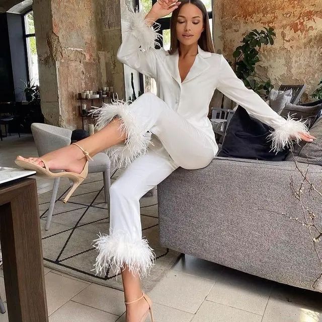 Lune London | Silk pajama set with feather trim on the cuffs