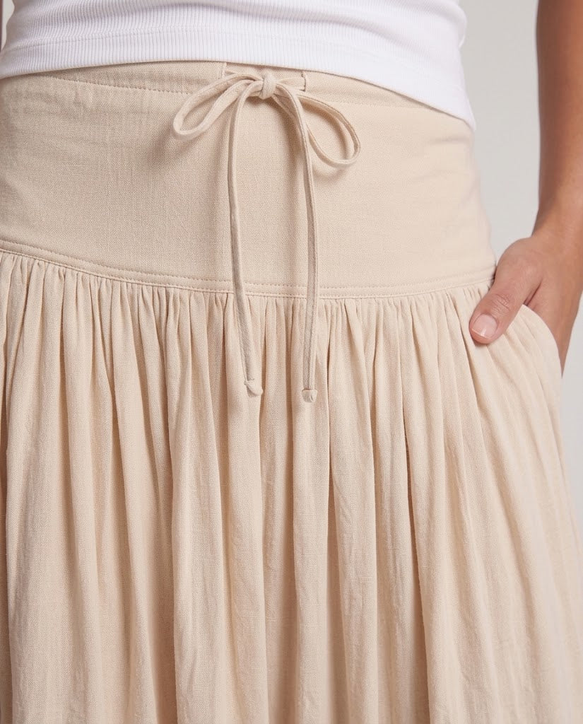 Women's flowing max skirt with high elastic waistband, drawstring, and crinkle texture Amarae