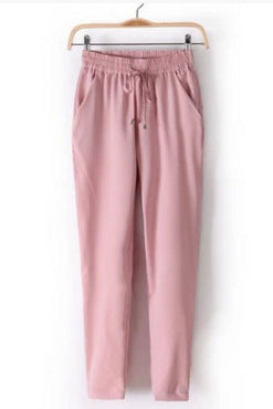 Sporty leisure pants for women with elastic waistband and practical side pockets Lune London