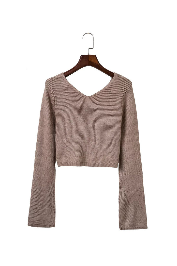Cropped knitted sweater for women with asymmetrical design and fitted pencil skirt Lune London