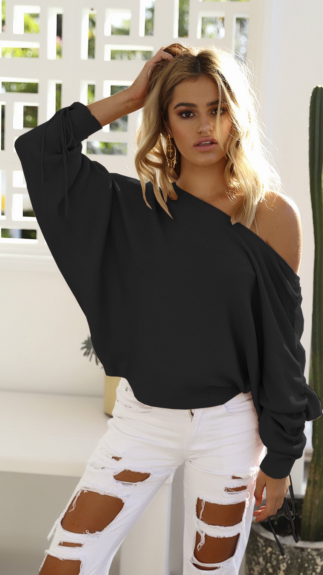 Pull oversized femme à coupe asymétrique Chic & Stil