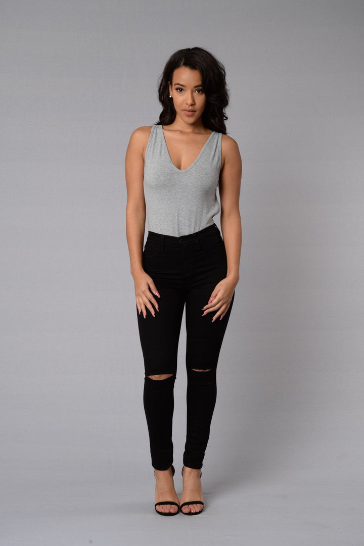 High-waisted skinny jeans for women with trendy tear details Lune London