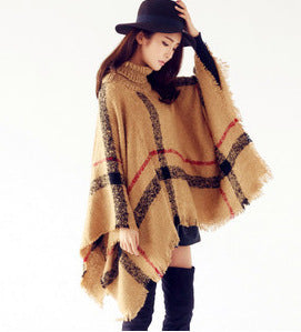 Knit poncho for women with high collar and trendy fringe design Amarae