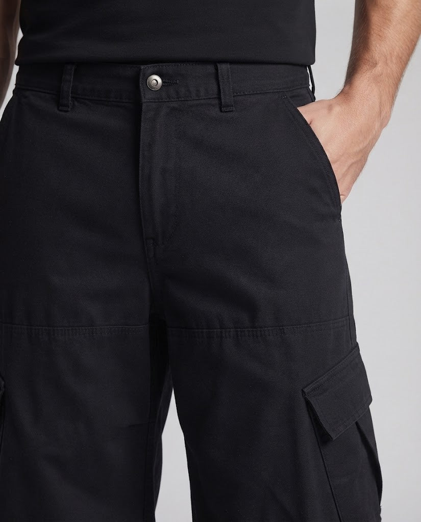 Men's workwear-inspired balloon cargo pants with extremely wide legs and multiple flap pockets Amarae