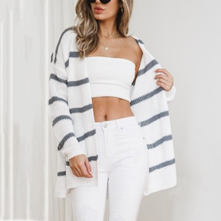 Ladies chunky knit cardigan with large pockets and a modern striped pattern Lune London