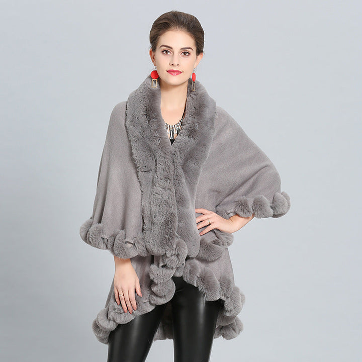 Ladies hooded poncho with luxurious fur collar and elegant trim Lune London