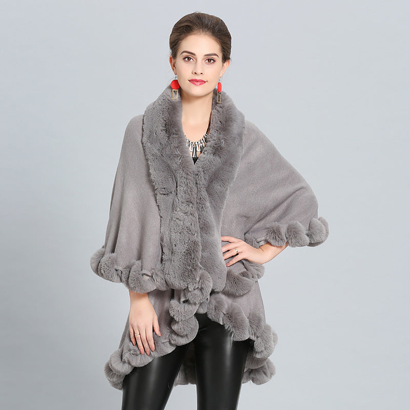 Ladies hooded poncho with luxurious fur collar and elegant trim Lune London
