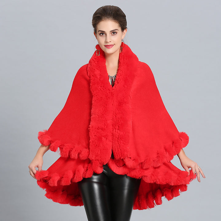 Ladies hooded poncho with luxurious fur collar and elegant trim Lune London