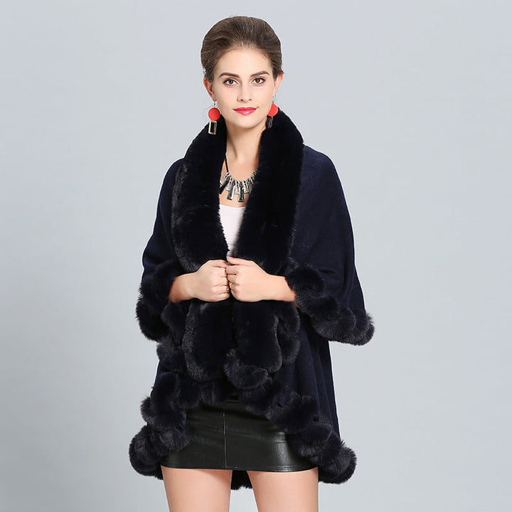Ladies hooded poncho with luxurious fur collar and elegant trim Lune London