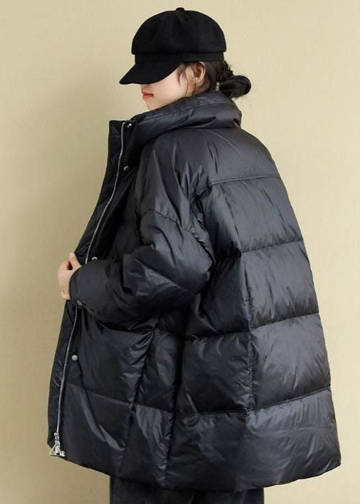 Amarae | Oversized black goose down winter coat with high collar and pockets