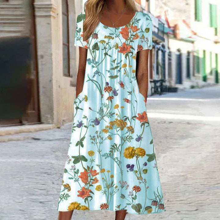 Lune London | Maxi dress in Bohemian style with floral pattern and pockets Short-sleeved maxi dress with floral pattern in Boho chic style for women