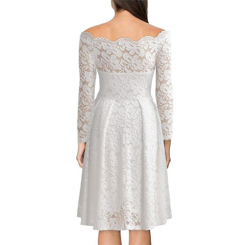 Lune London | Lace dress with a slit at the neckline and sleeves