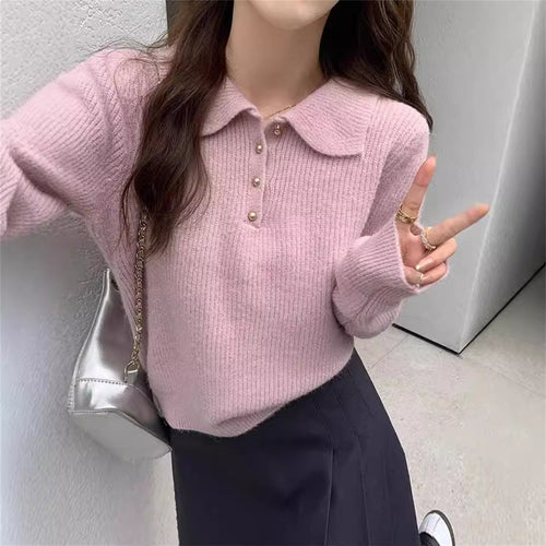 Pull féminin avec col polo texturé et détails de boutons Chic & Stil