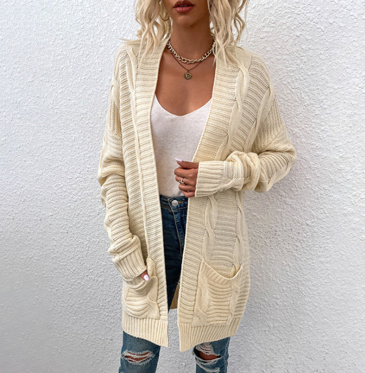 Cardigan en tricot épais pour femmes avec décolleté en V plongeant et poches pratiques Chic & Stil