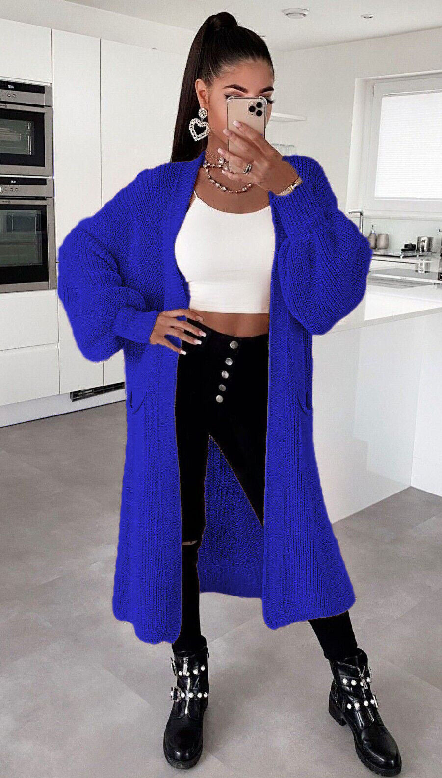 Ladies long cardigan with a chunky knit structure and practical pockets Lune London