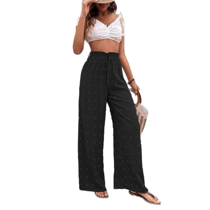 Wide palazzo pants for women with elastic waistband and decorative pattern Lune London