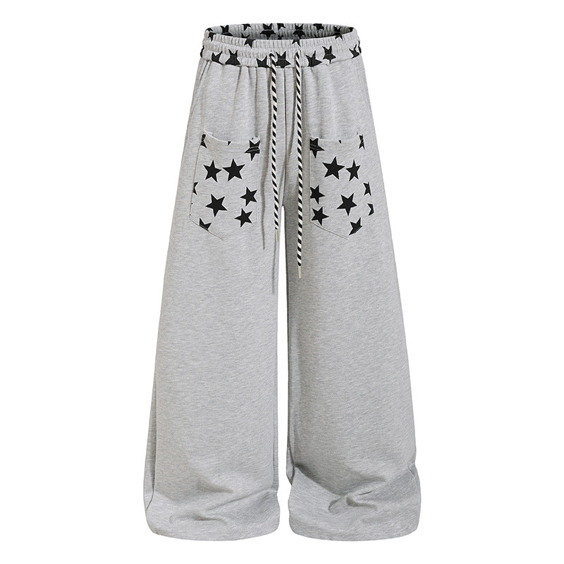 Women's extra wide palazzo sweatpants with comfort waistband, drawstring and star appliqué Amarae