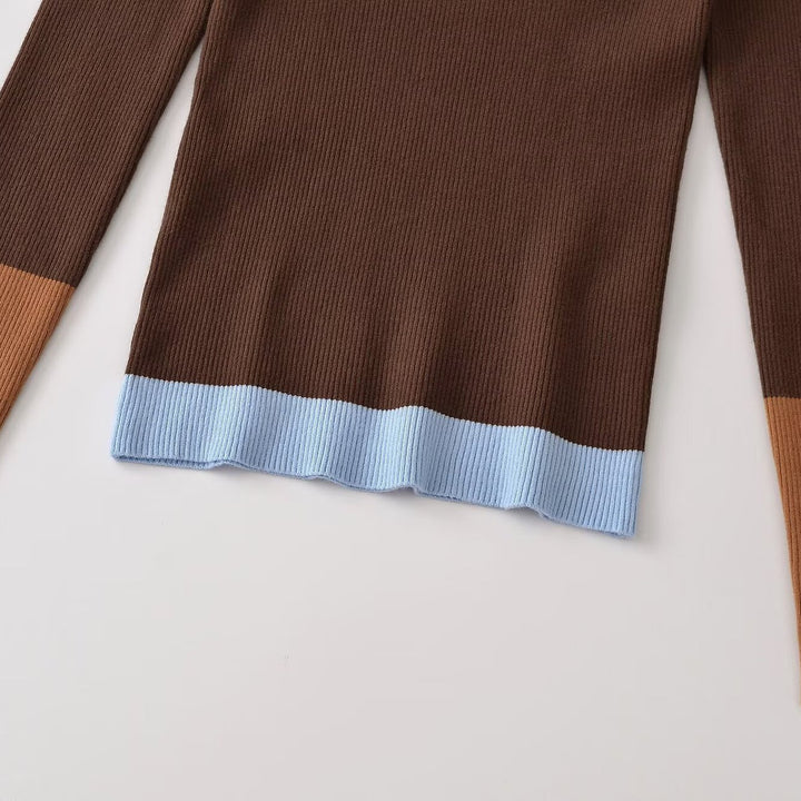 Women's figure-hugging ribbed knit sweater with polo collar, button placket, and color block details Amarae