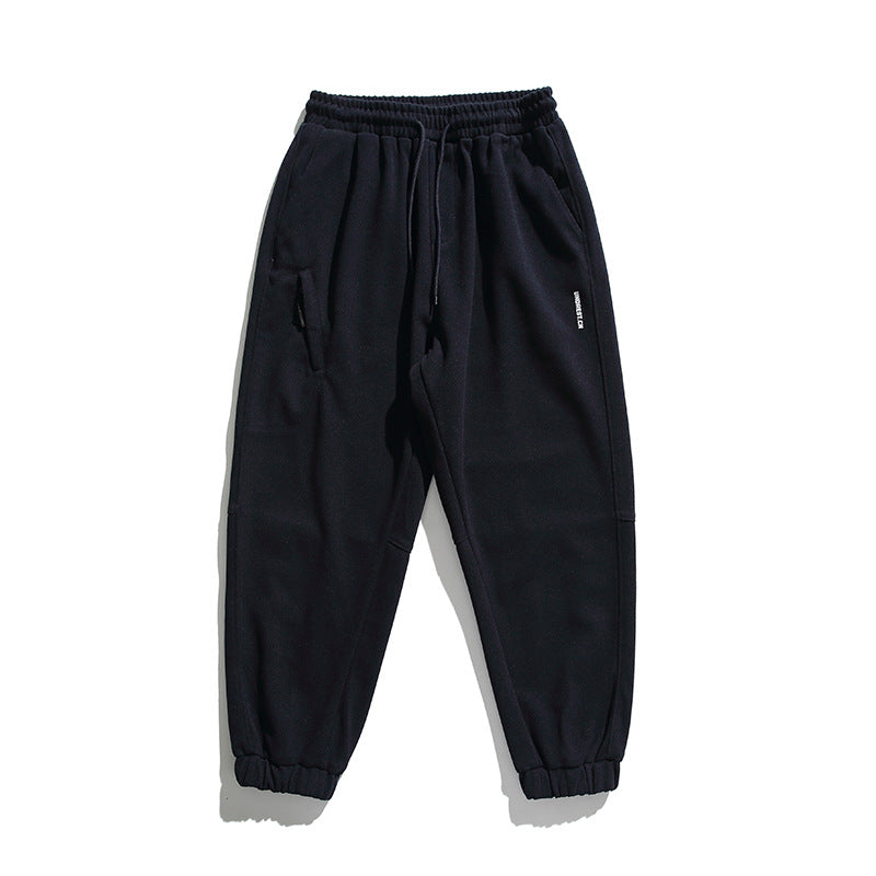 Unisex wide jogging pants in oversized cut with elastic waistband, knee panel and ribbed cuffs Amarae