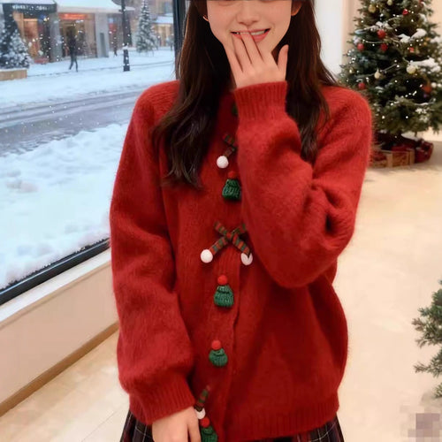 Cardigan pour femmes avec des appliqués festifs et des détails de boutons Chic & Stil