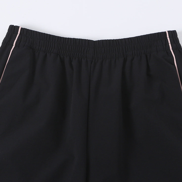 Women wide training pants with contrasting piping and elastic waistband Amarae