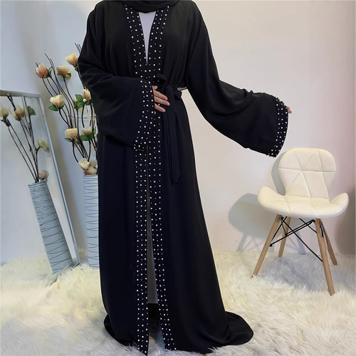 Elegant ladies Abaya with elaborate rhinestone details and a chic waist belt