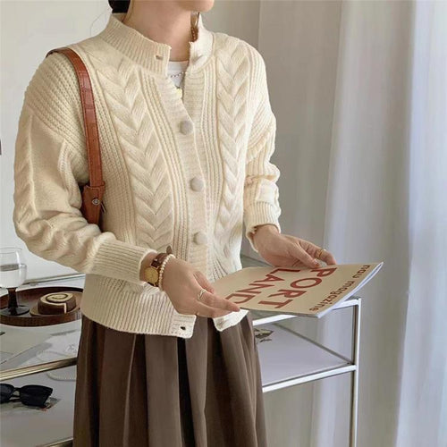 Comfortable knitted cardigan for women with braided pattern and large buttons Amarae