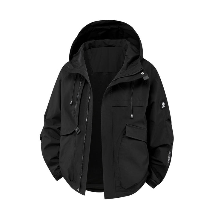 Technical outdoor jacket for men in waterproof material with numerous zippered pockets Lune London