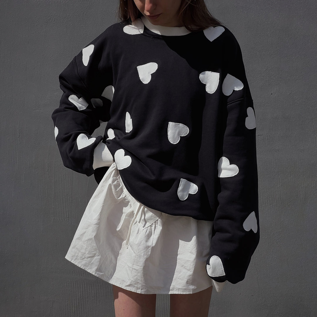 Women's hoodie with creative heart pattern and oversized relaxed fit Lune London