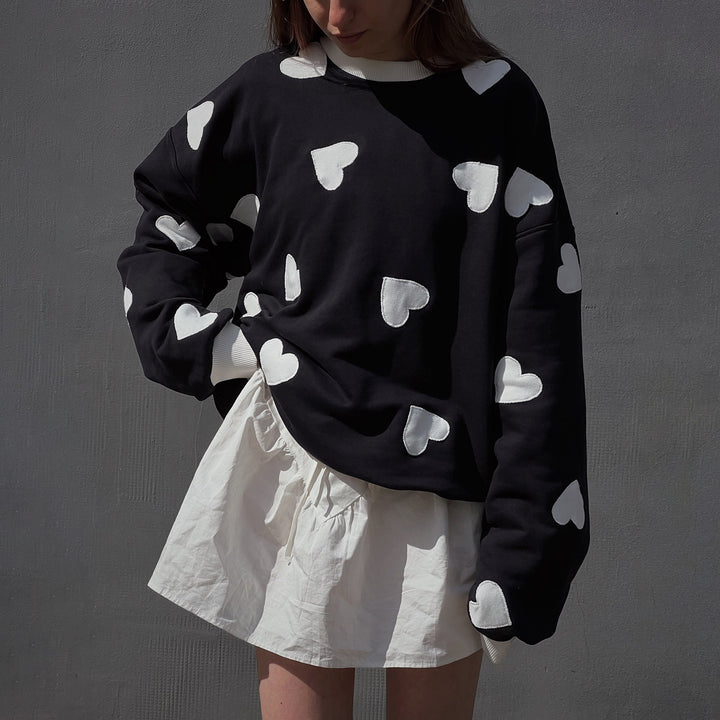 Women's hoodie with creative heart pattern and oversized relaxed fit Lune London