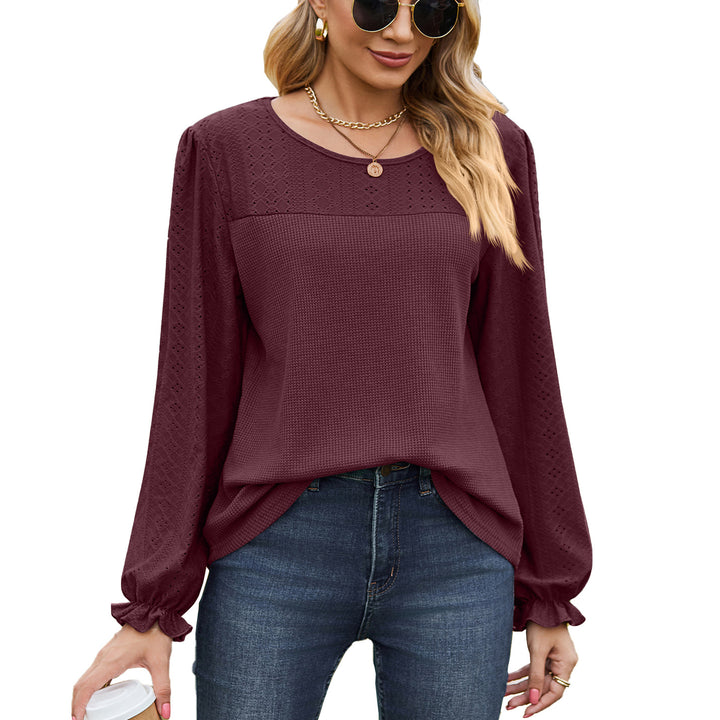 Women's top with textured design and elegant puff sleeves Amarae