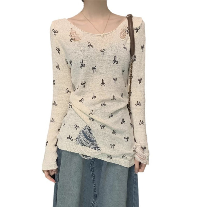 Women's long sleeve shirt with stylish rips and playful motif Lune London
