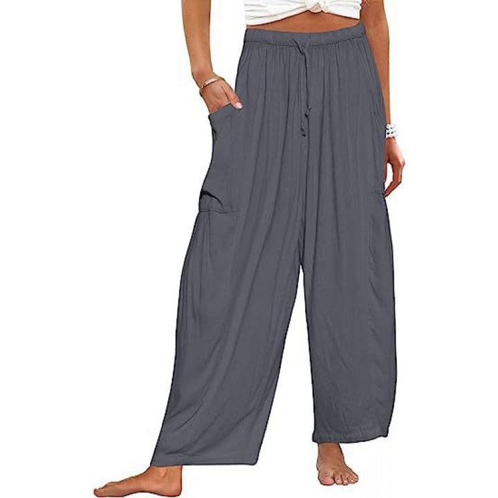 Casual harem pants for women with practical side pockets and loose fit Lune London