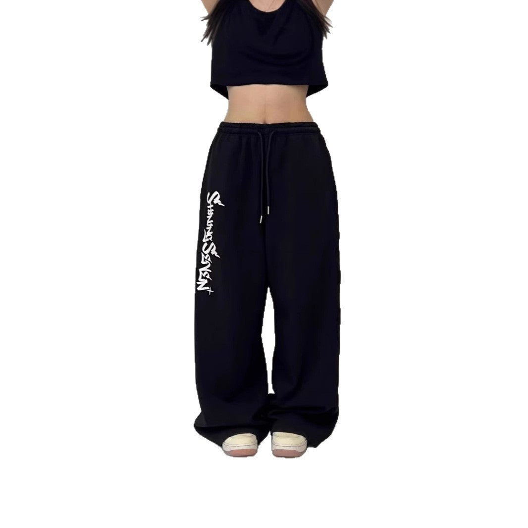 Women's casual jogging pants with a wide cut and sport graphic Chic & Stil