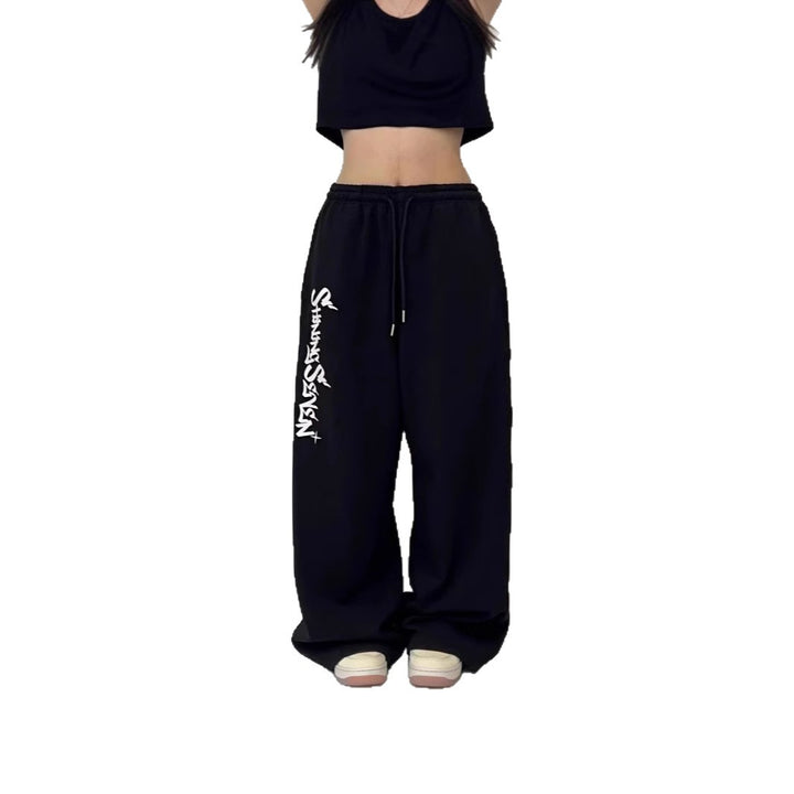 Women's casual jogging pants with a wide cut and sport graphic Chic & Stil
