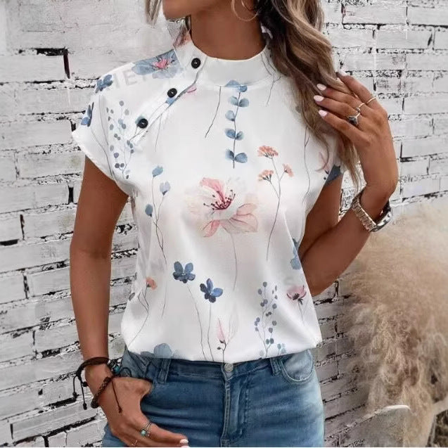 Women’s blouse with floral pattern and cape sleeves Lune London