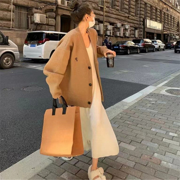Blazer tricoté oversize pour femmes avec une coupe tendance et un motif de tricot fin Chic & Stil