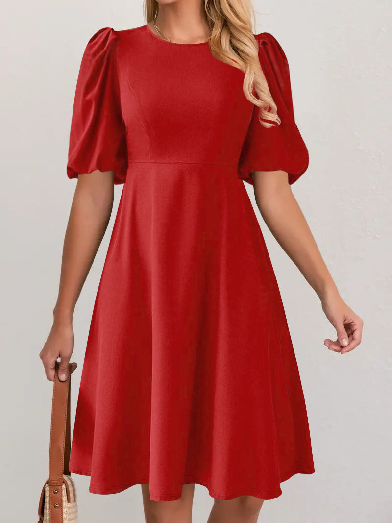 Puff sleeve dress for women with a flowing cut and waist accentuation Lune London