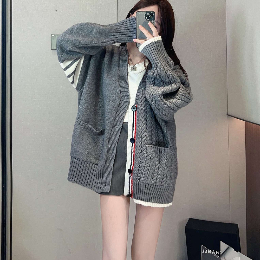 Women's chunky knit cardigan with cable pattern and generous pockets Lune London