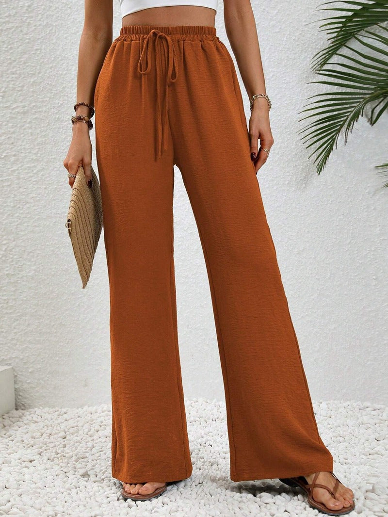 Loose-fit leisure pants for women with an elastic waistband and practical side pockets Lune London